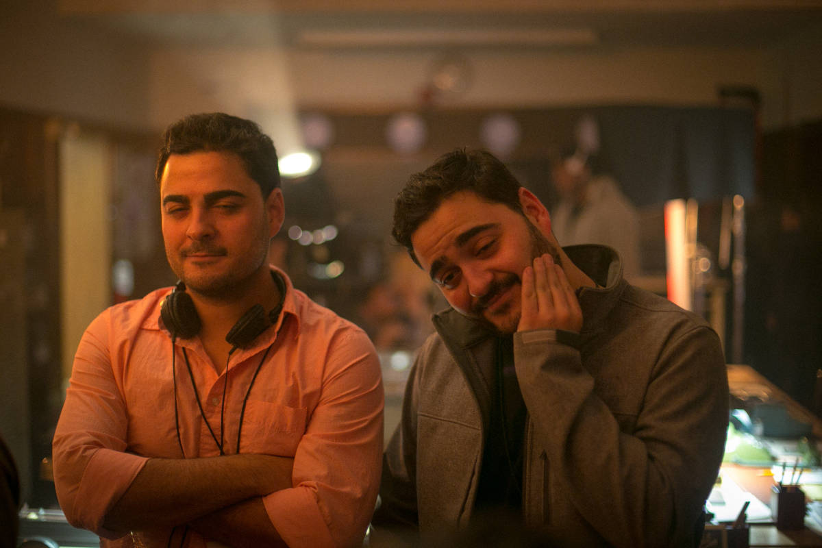 This light hearted photo captures the Francisco brothers enjoying a rare moment to relax between takes.